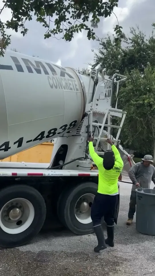 Concrete truck pouring on a job site